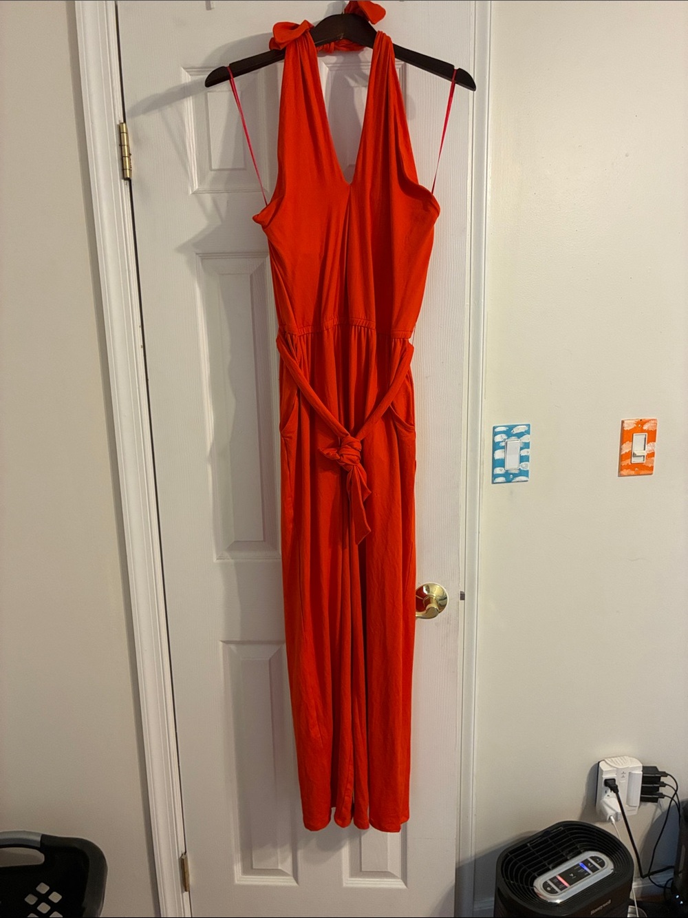 Sofia VergaraBright Orange Sleeveless Halter Jumpsuit